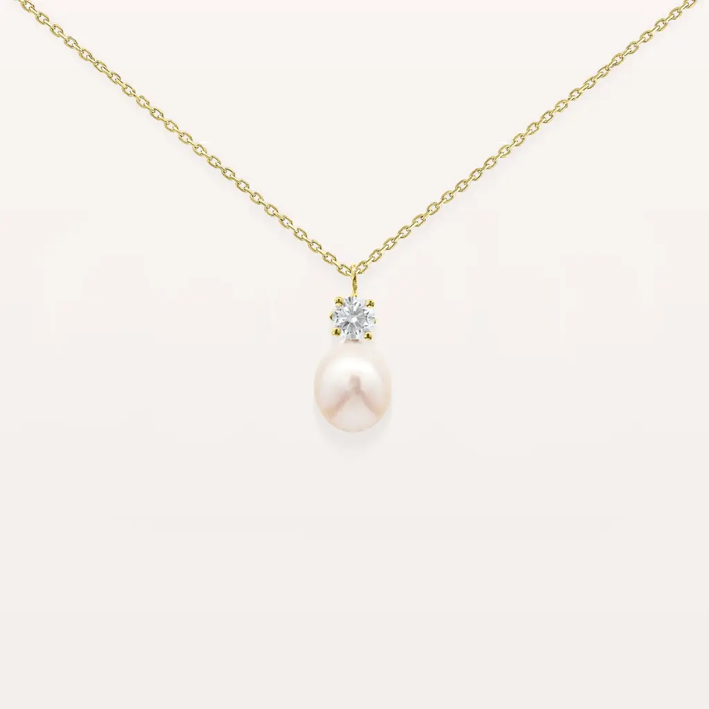 Collier pendentif en or avec perle ovale et diamant étoilé