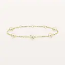 Bracelet chaîne en or avec perles habillées d’un motif torsadé
